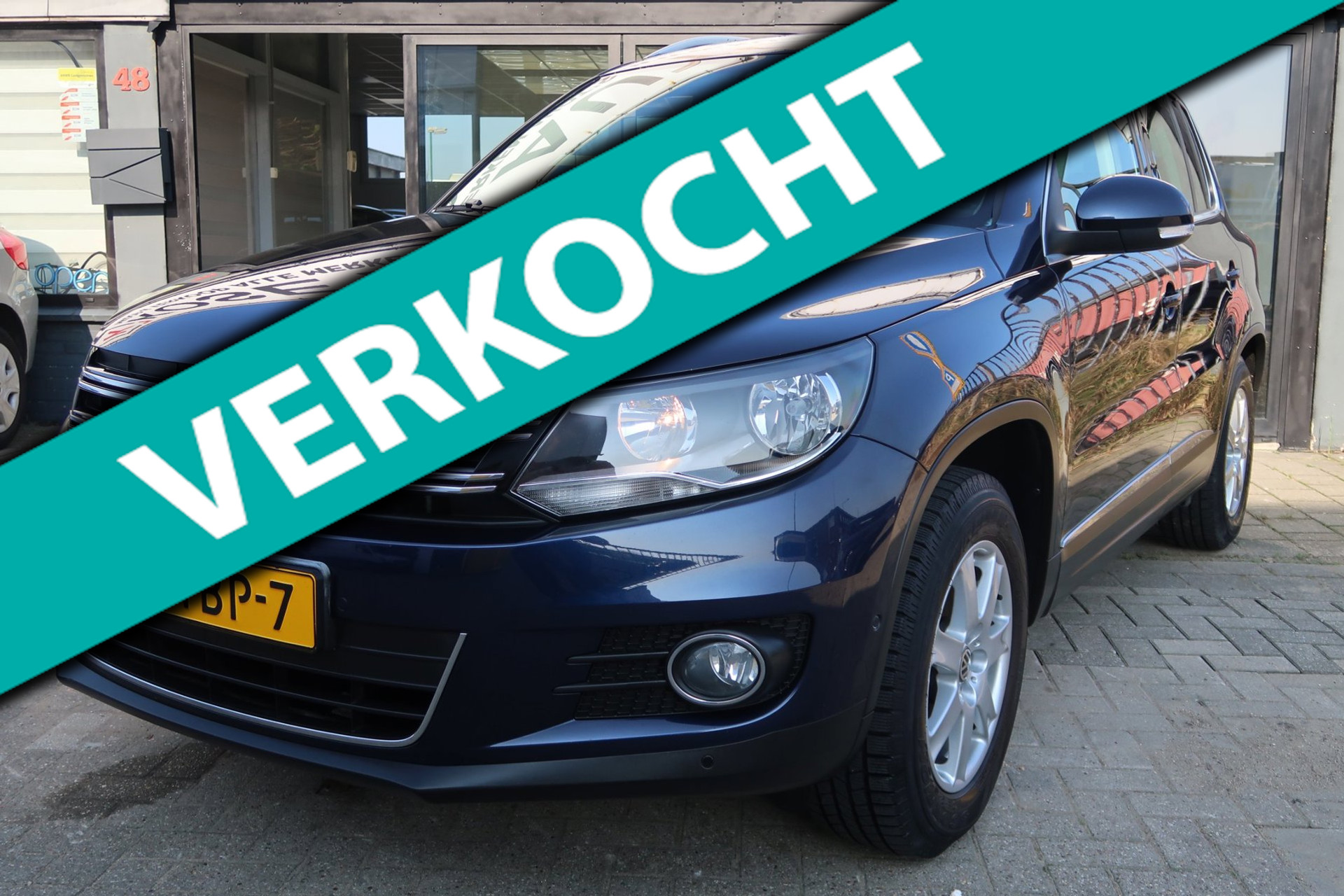 Volkswagen Tiguan 1.4 TSI Sport&Style *Rijklaarprijs *Trekhaak *Dealeronderhouden 50433319-0.jpg | Kose Autos